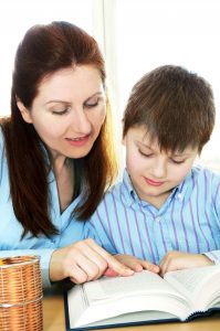 Teacher and student reading 