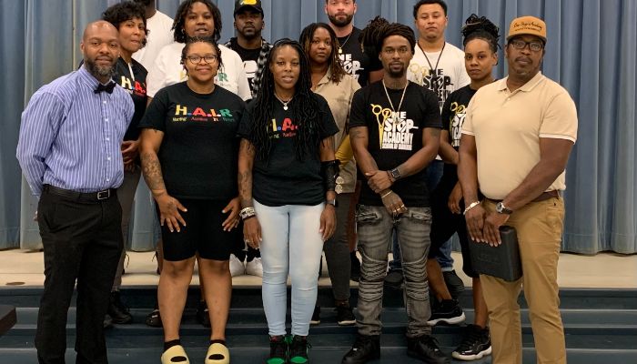  This is an image of the barbers and cosmetologists that sponsored this year's event. 